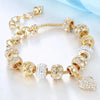 A gold and clear rhinestone beaded love bracelet set for women displayed on a white background.