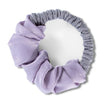 A lavender heatless hair curling scrunchie made of gathered fabric.
