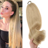 A close-up of a woman modeling an ultra-long straight blonde hair extension wig.