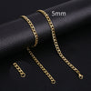 Gold-colored stainless steel Cuban link necklace displayed on a black background with a 5mm scale marker.