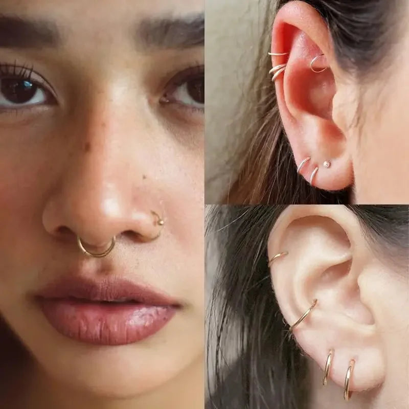 Nahaufnahme des Gesichts und des Ohrs einer Frau mit chirurgischen Stahl-Nase-Hörigen und verschiedenen Ohrpiercings.