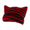 A knitted beanie hat featuring horizontal stripes of black and red yarn.