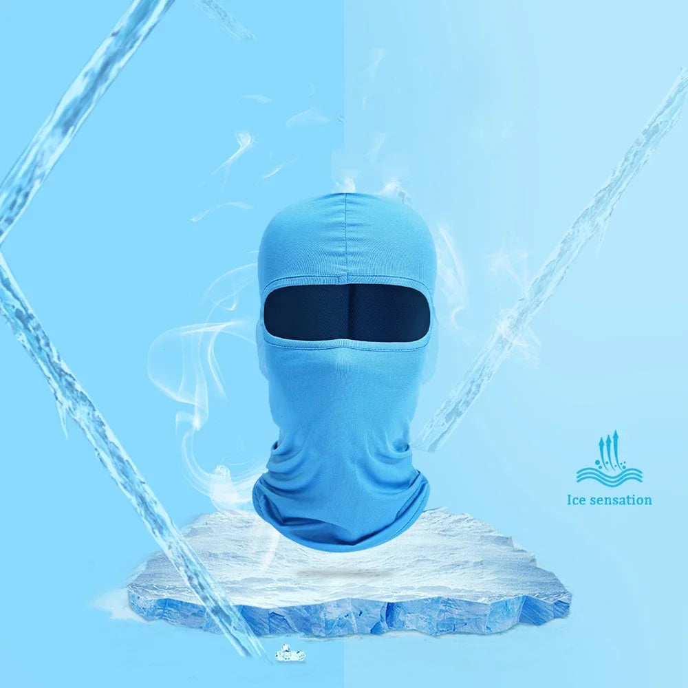 A light blue tactical full face balaclava is shown floating above a piece of ice with wisps of steam.