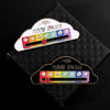 A gold-toned brooch pin featuring a cloud design with a mood tracker strip showing various facial expressions.