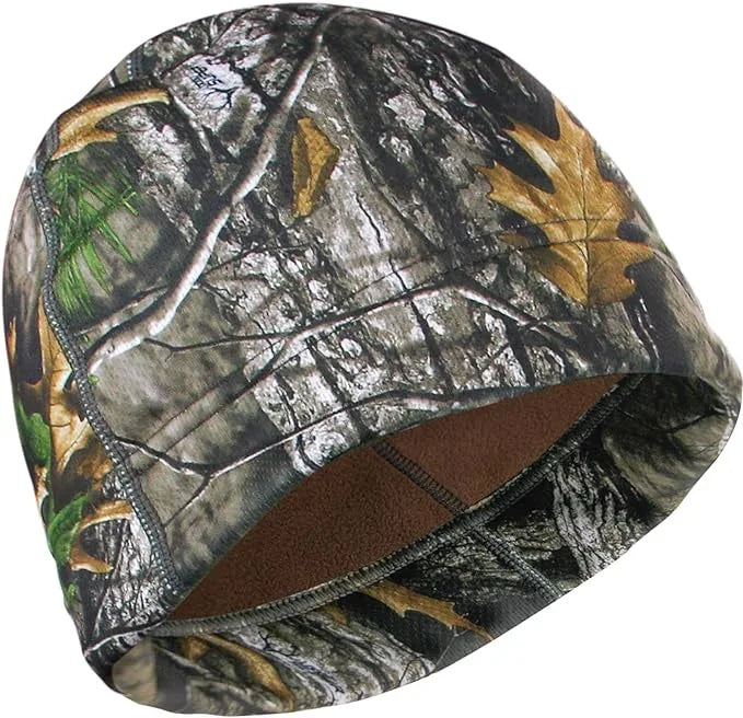 A camouflage thermal beanie featuring a pattern of dark green, black, and brown leaves and branches.