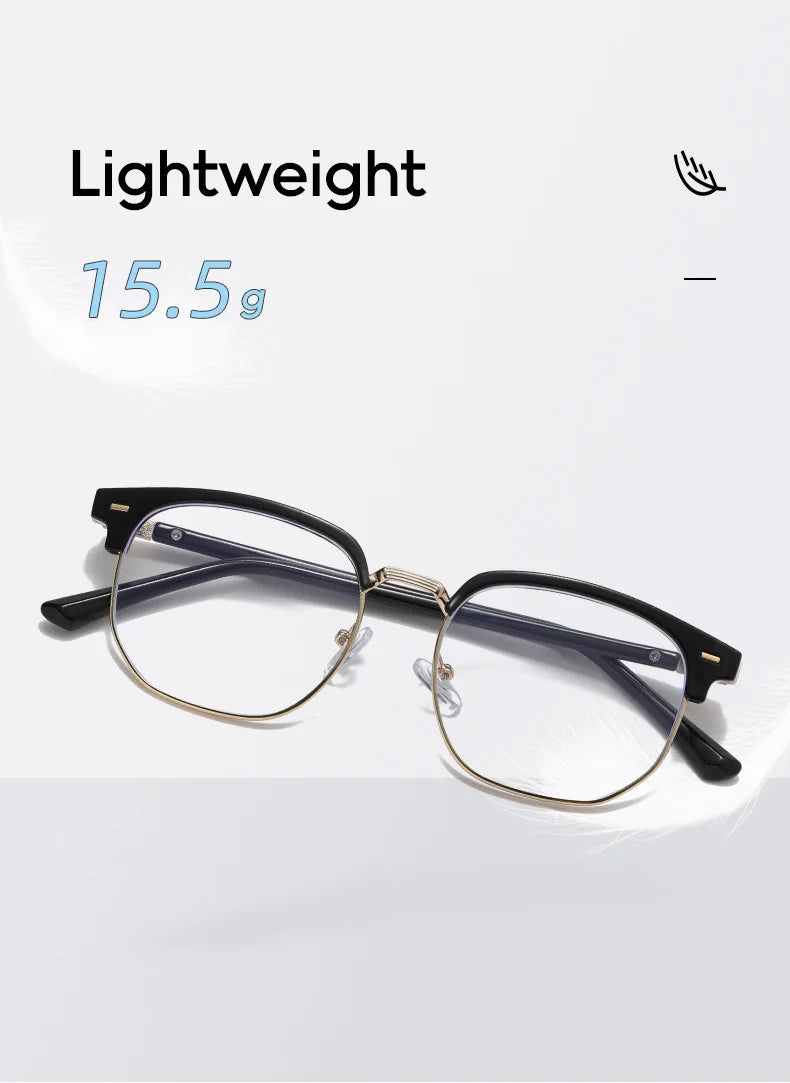 Une paire de lunettes à monture fine et légère avec des accents dorés, sur fond blanc.
