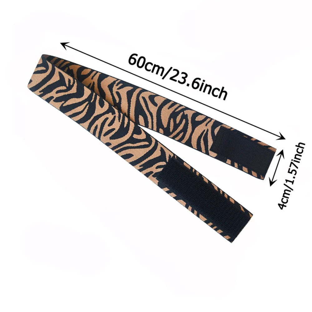 A black and tan patterned fabric strap measuring 60cm long, used as an adjustable lace headband.