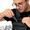 A man is using a precision eyeglass temple adjustment tool to modify eyeglasses.