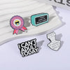 Three enamel lapel pins featuring phrases like Don't Want to Grow Up I Don't Want to Adult Today and I Can't Adult Today