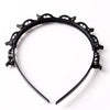 Black multi-layer braided hair headband clip with decorative metal accents
