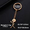Gold-colored stickman keychain with a middle finger gesture and size specifications