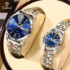 A pair of BINDOND stainless steel couple watches with blue dials and silver bracelets displayed on a light background.