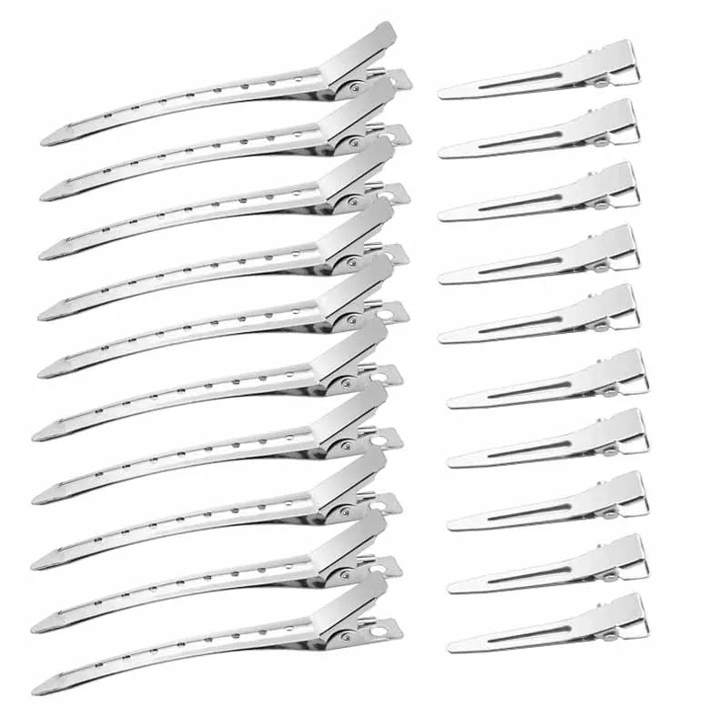 A collection of professional fixed hair pins for styling in silver metal.