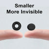 A hand holds two small black silicone ear hooks, demonstrating their size and invisibility.