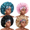 Four satin sleep bonnets in teal, pink, black, and gold accents shown on models.