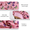 Pink butterfly satin sleep bonnet and headband set showing fabric texture and reflection