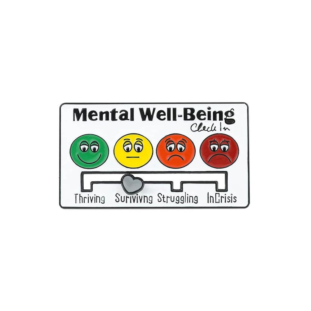 A brooch pin featuring five facial expressions representing mental well-being: happy, neutral, sad, angry, and distressed.