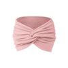 A soft dusty rose fabric headband tied in a knot for yoga or sports.