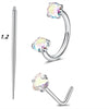 A set of silver horseshoe nose rings, including a straight stud and a curved hoop design.