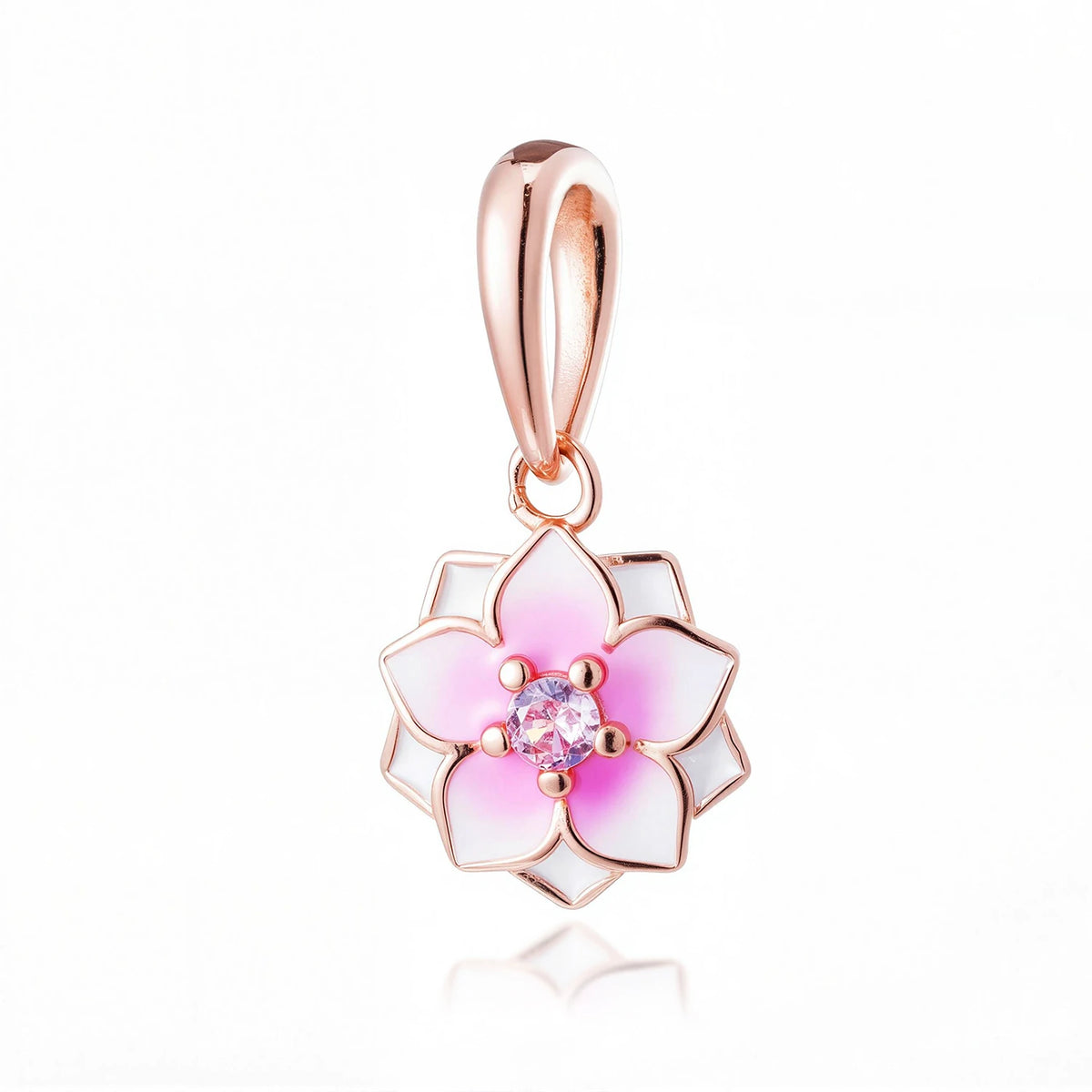 Un delicado colgante de oro rosa con un diseño floral rosa y blanco y un centro de gema transparente.
