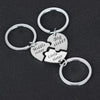 Silver keychain set featuring puzzle heart charms labeled Middle, Big, and Little sister
