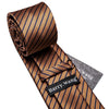 A close-up of a brown silk jacquard tie featuring blue diagonal stripes and a black name tag.