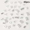 A collection of 40 silver elegant hollow hair rings for braids displayed on a white background.