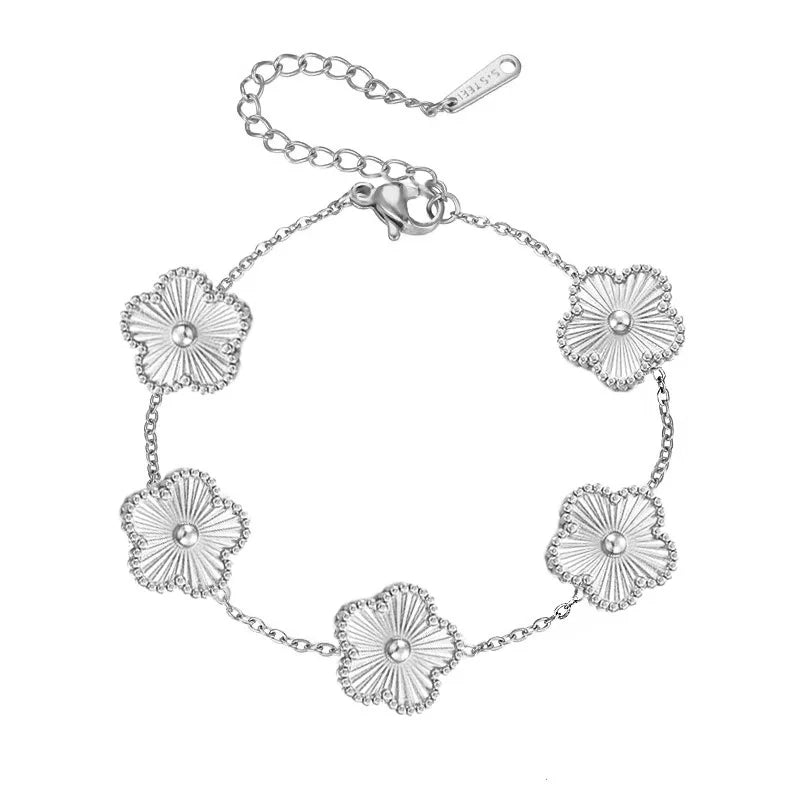 Gold plated stainless steel double-sided petal bracelet with a chain and flower charms