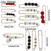A collection of heavy duty pearl safety pins in various sizes and styles for clothing.
