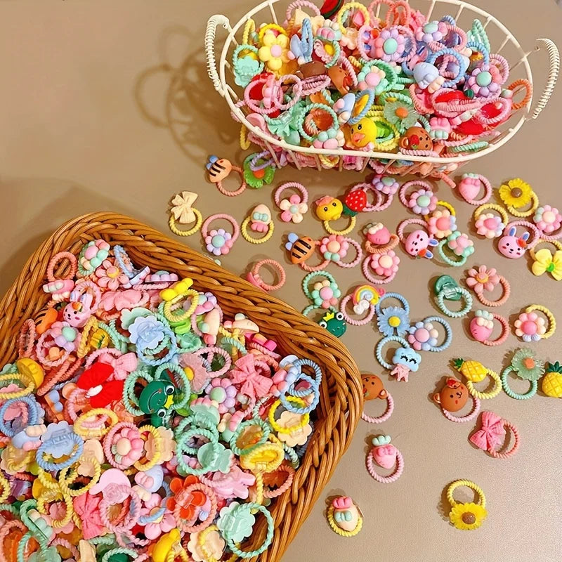 A collection of colorful decorative elastic hair bands and accessories in various pastel shades are displayed in woven basket