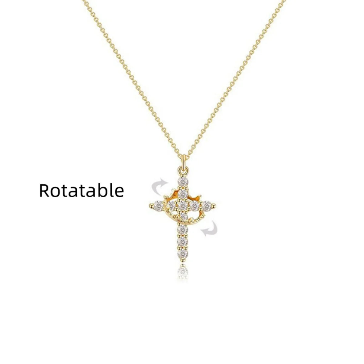 A gold-toned rotatable cross pendant necklace featuring small diamonds.