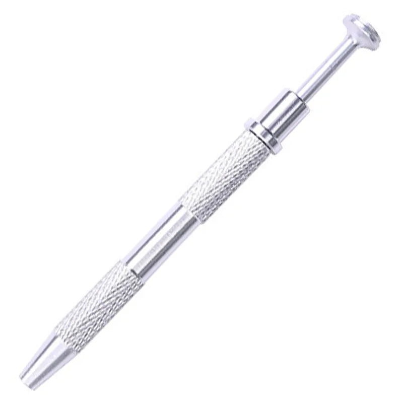 A silver precision four-claw jewelry pick-up tool with a textured handle and pointed tip.