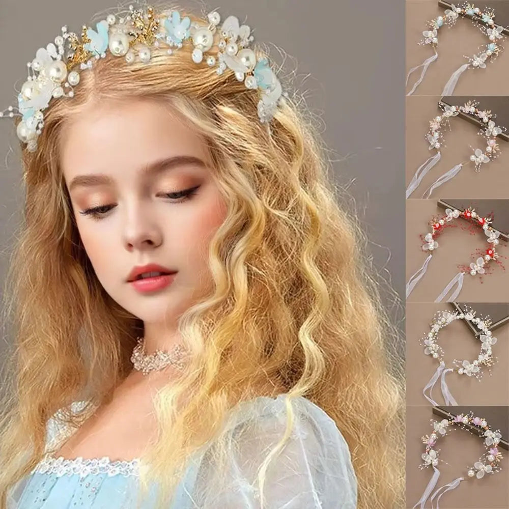A young woman models an elegant floral wreath headband with pearl accents on her blonde hair.