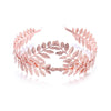 A delicate rose gold leaf headband for bridal or party wear.