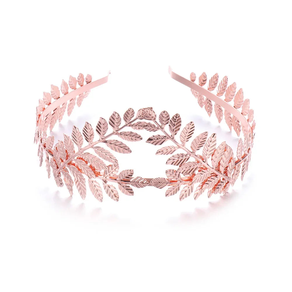 A delicate rose gold leaf headband for bridal or party wear.