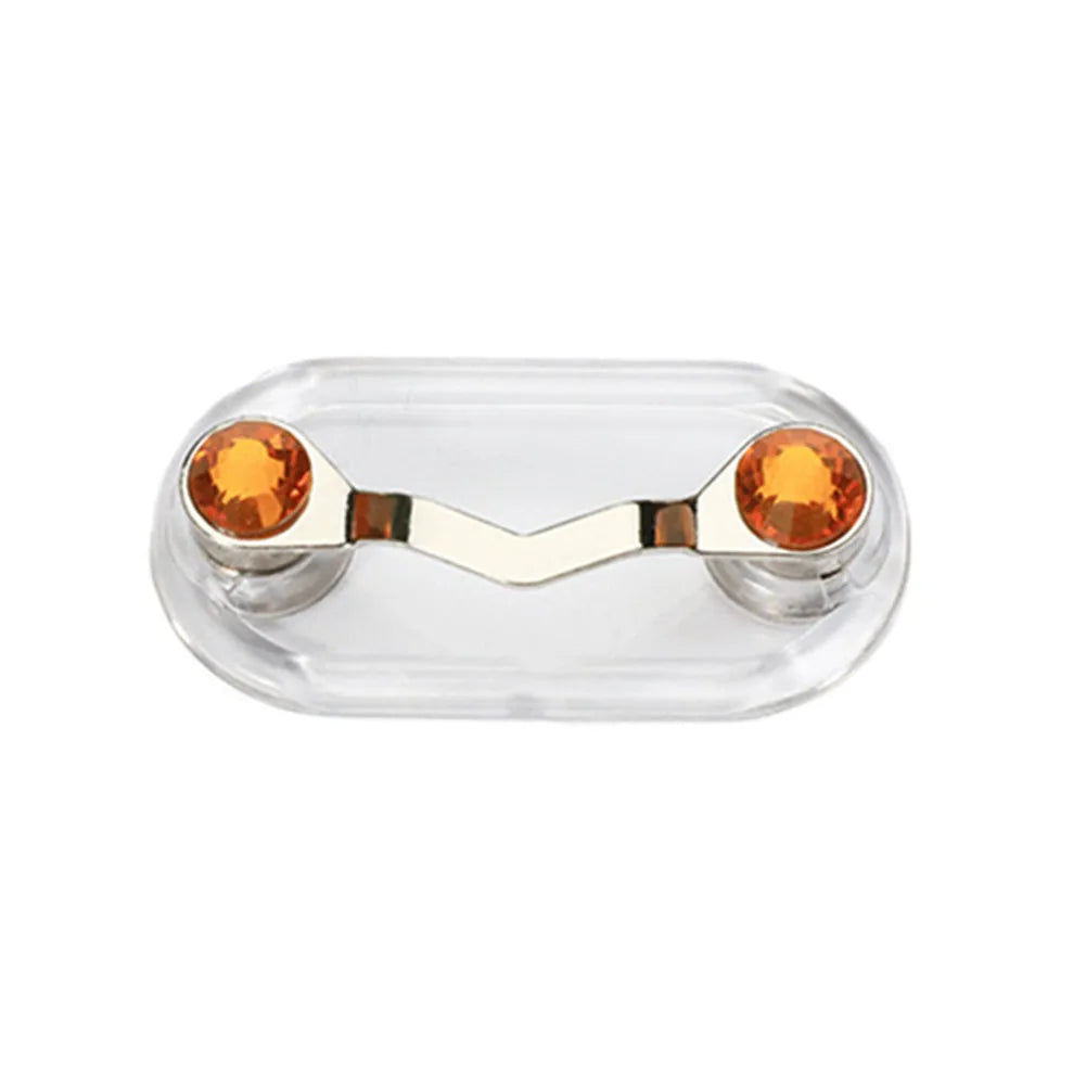 A clear plastic magnetic clip for holding eyeglasses, featuring two orange-tinted holders.
