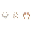 A set of three magnetic stainless steel septum rings in rose gold tone.