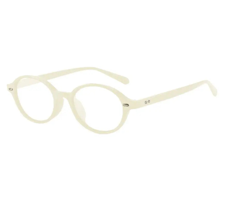 A pair of round, light beige anti-blue light computer glasses with thin metal arms.