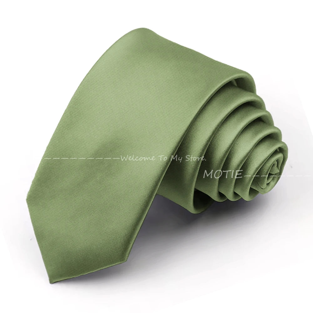 A folded olive green satin neck tie for formal wear.