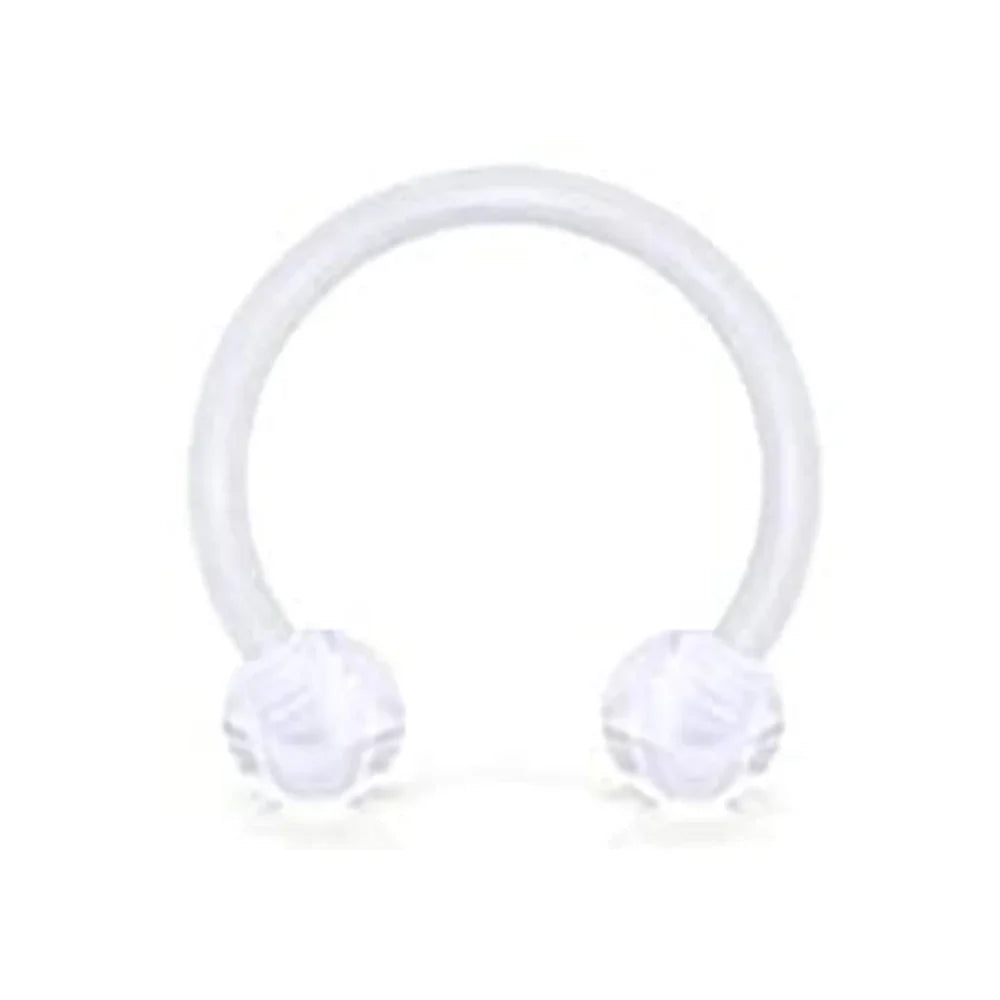 A clear silicone horseshoe barbell ring set for body jewelry.