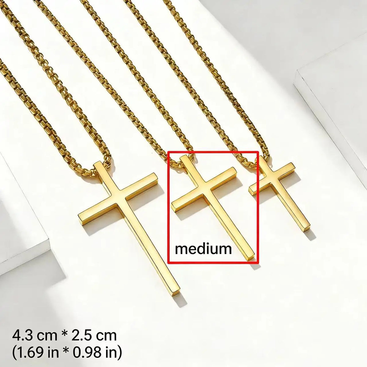 Gold stainless steel cross pendant necklace for men shown on a white background