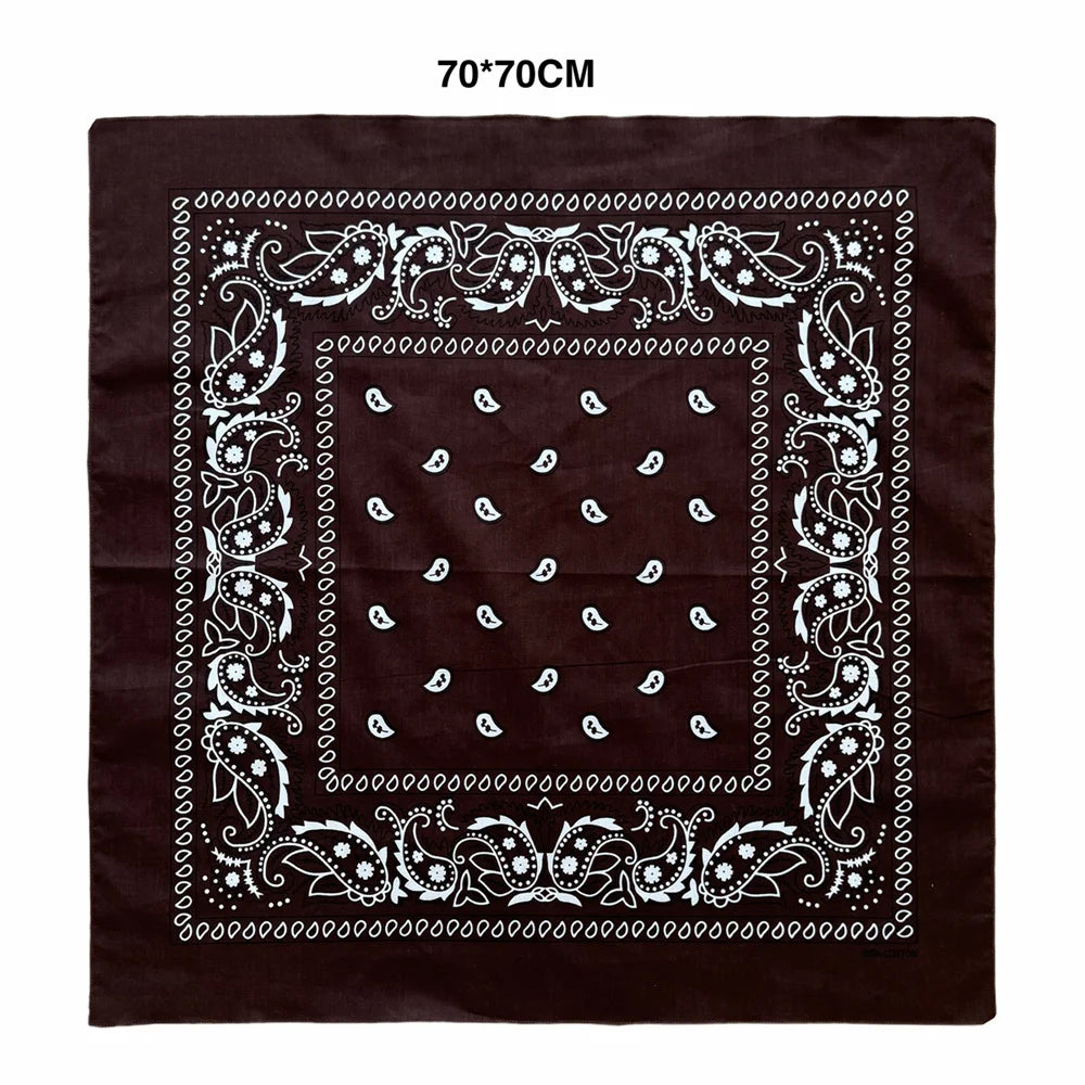 Dark brown square fabric featuring white paisley and decorative border embroidery