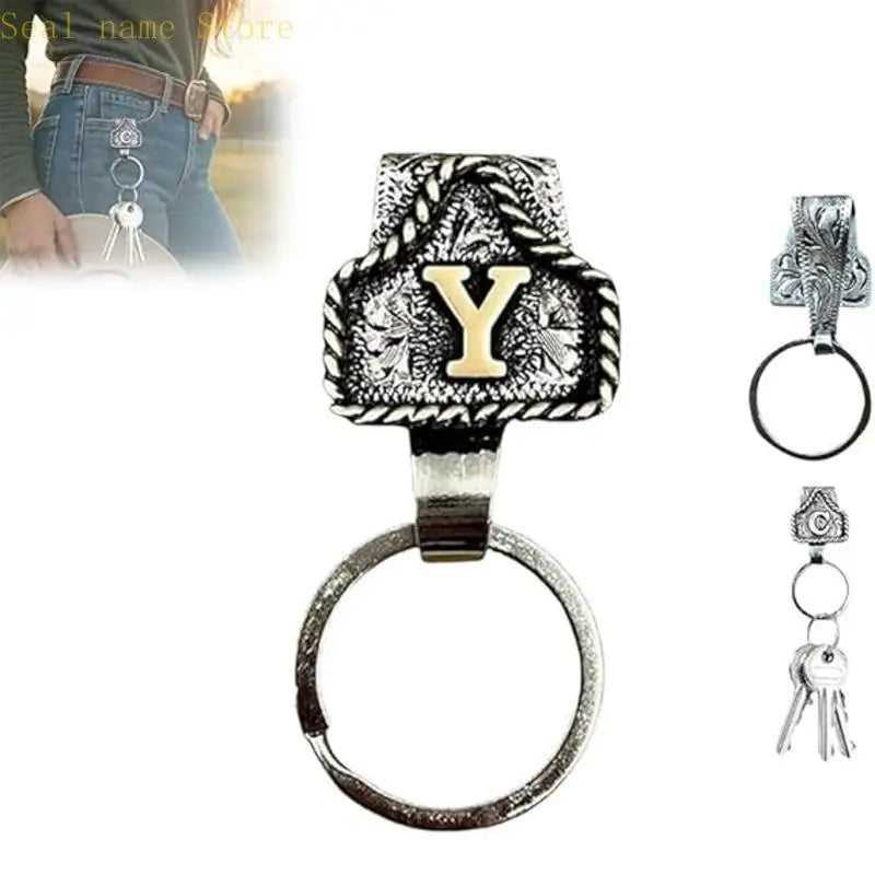 Silver letter Y pendant and ring keychain attached to a belt.