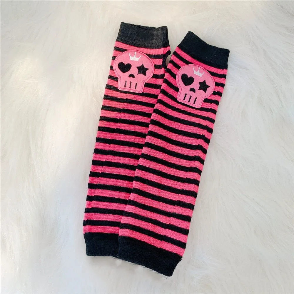 Black and pink striped fingerless socks featuring skull designs for Y2K grunge accessories