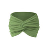 Olive green fabric headband tied in a knot for yoga or sports