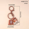 A brown leather coffee keychain featuring a ceramic coffee cup design.
