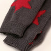 A pair of gray knitted half finger gloves featuring a red maple leaf pattern.
