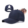 A dark navy breathable mesh baseball cap shown with a side view, featuring a criss-cross design and perforated details.