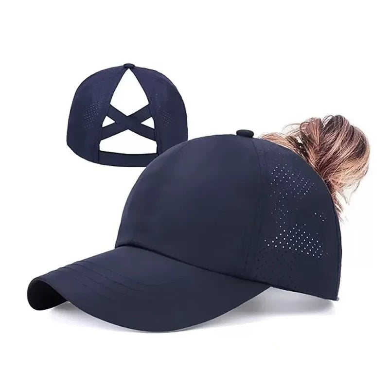 A dark navy breathable mesh baseball cap shown with a side view, featuring a criss-cross design and perforated details.