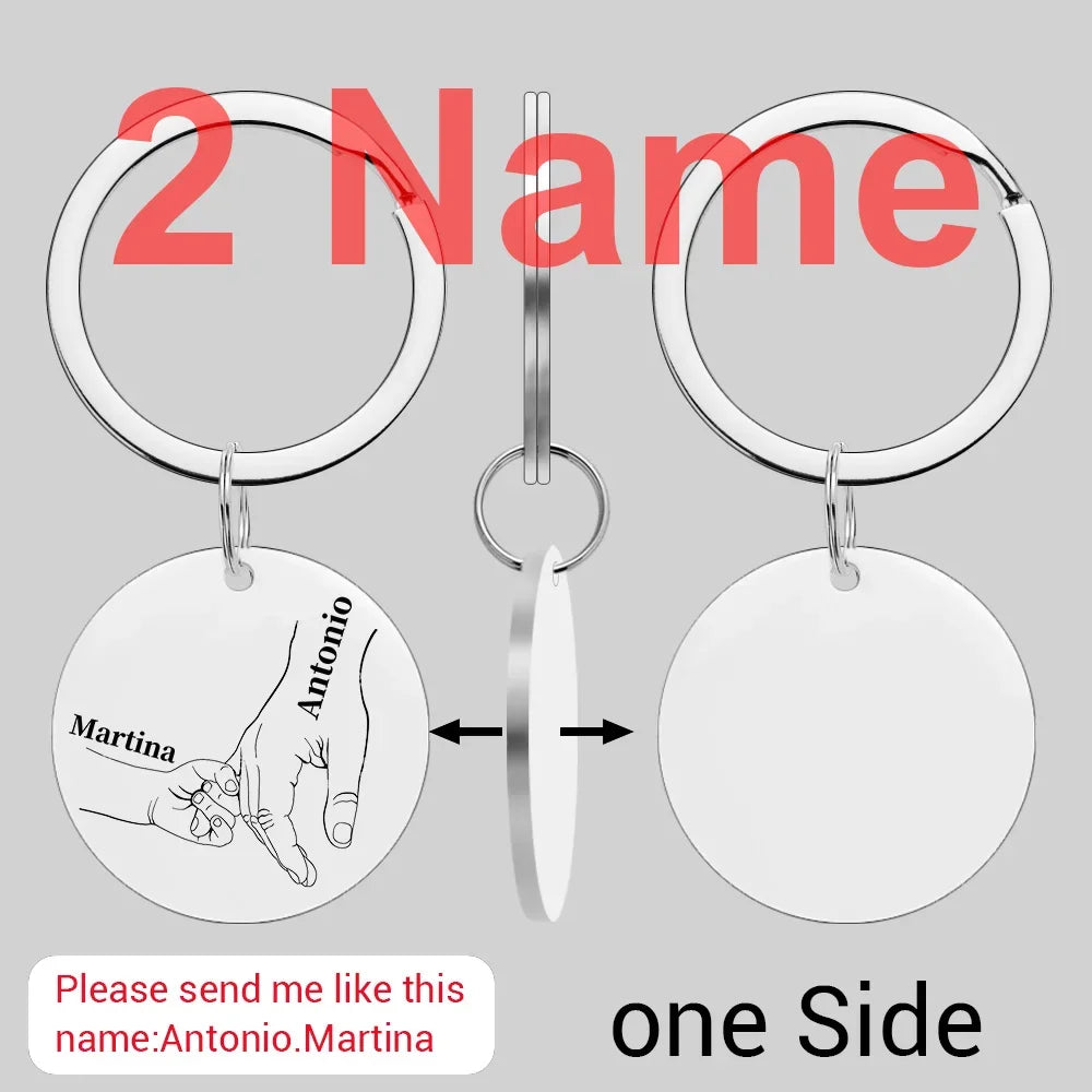 Two stainless steel keychains with names Antonio and Martina on one side